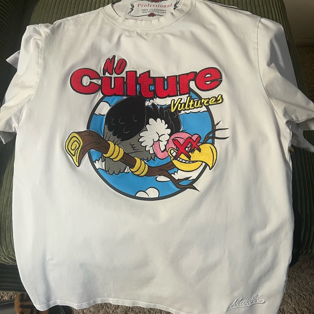 Mishka White Tee with Bold Cartoon Graphic